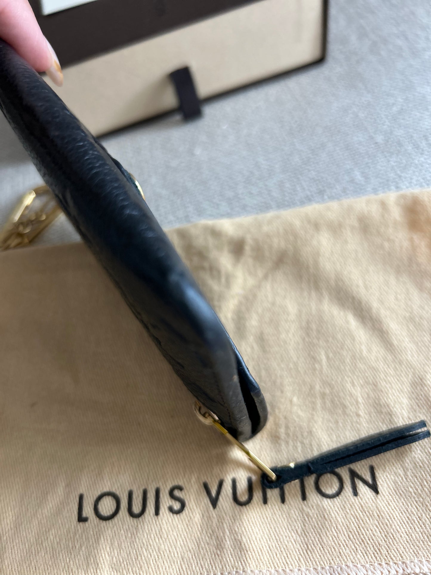 LOUIS VUITTON Empreinte Key Pouch in Noir Black.