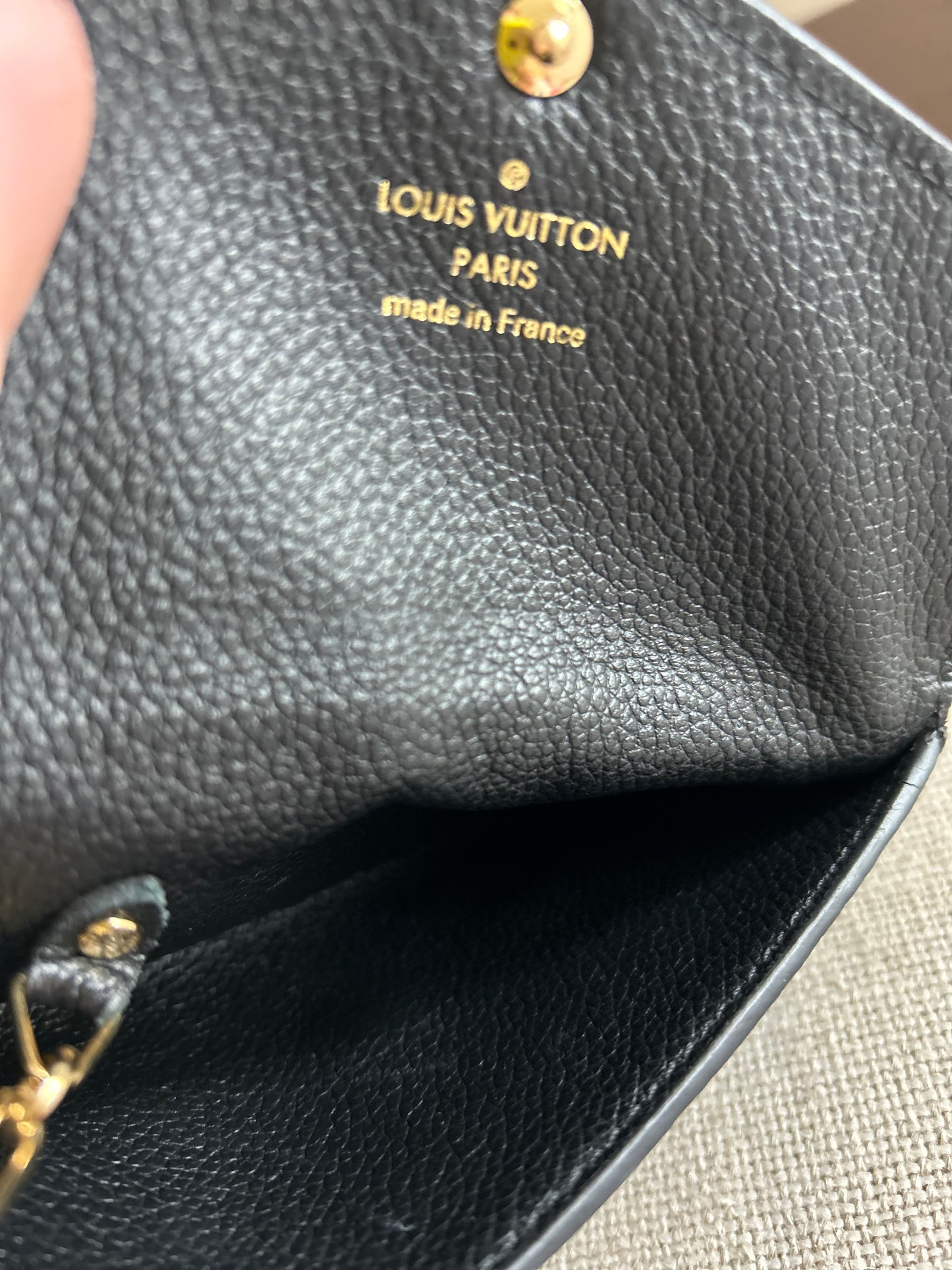 LOUIS VUITTON Empreinte Key Pouch in Noir Black.