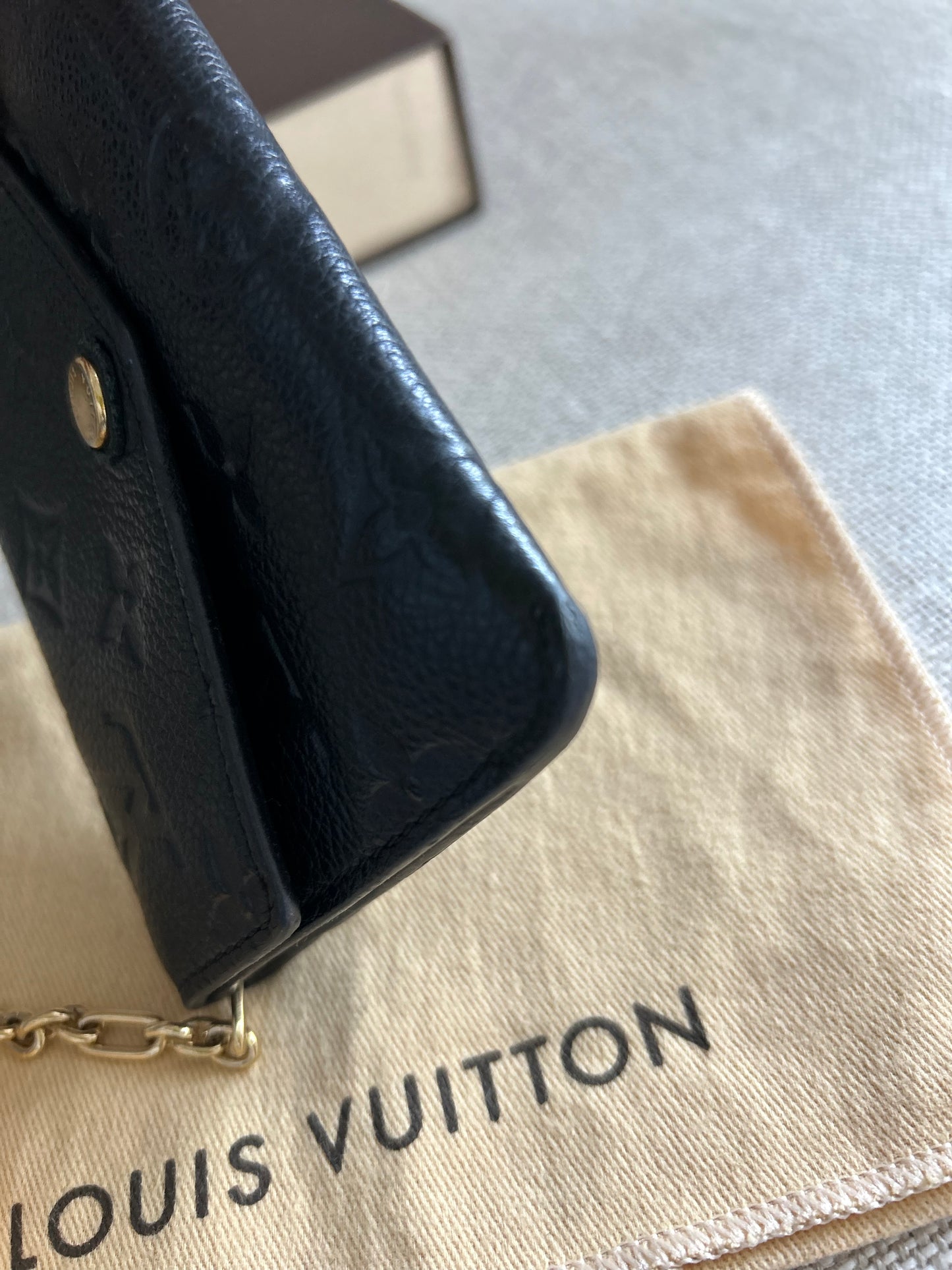 LOUIS VUITTON Empreinte Key Pouch in Noir Black.