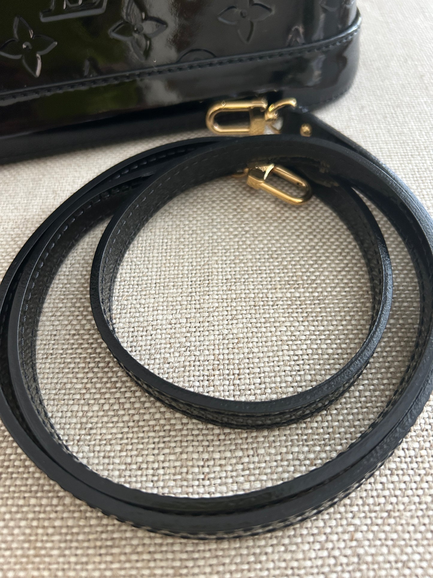 LOUIS VUITTON
Vernis Alma BB Noir Magnetique