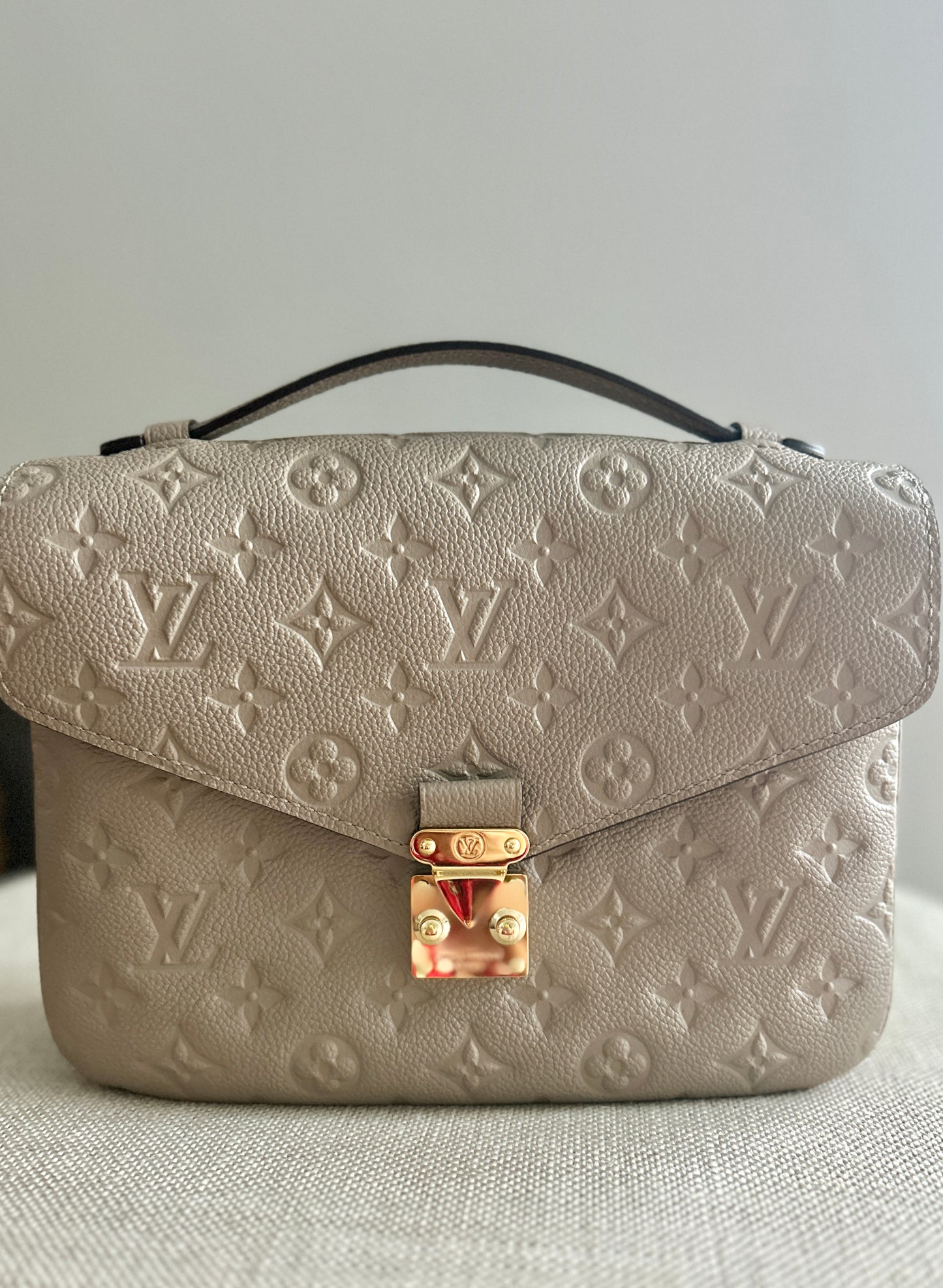 Louis Vuitton Empreinte Pochette Metis in Turtledove