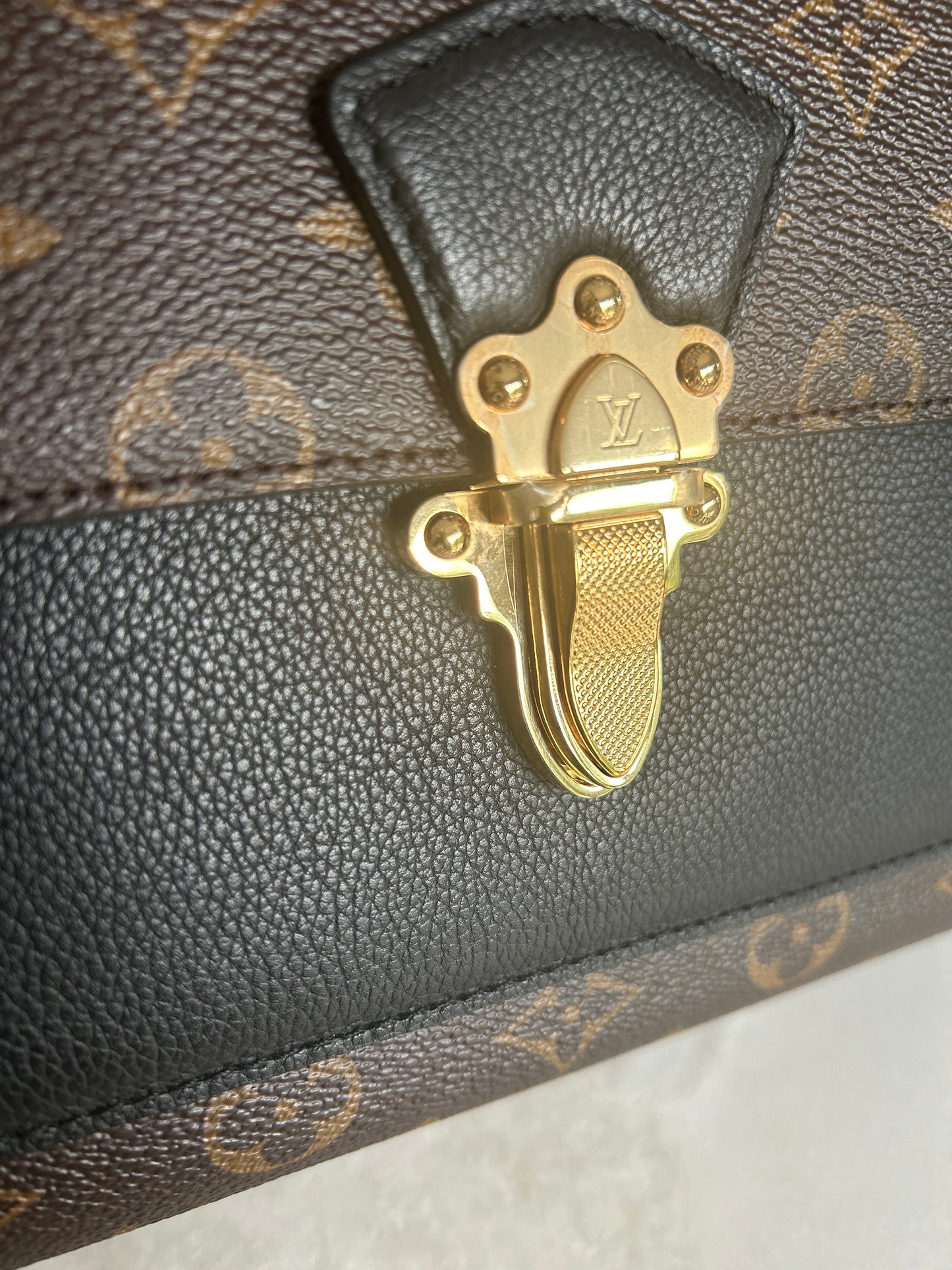 LOUIS VUITTON
Monogram Canvas Black Victoire Bag