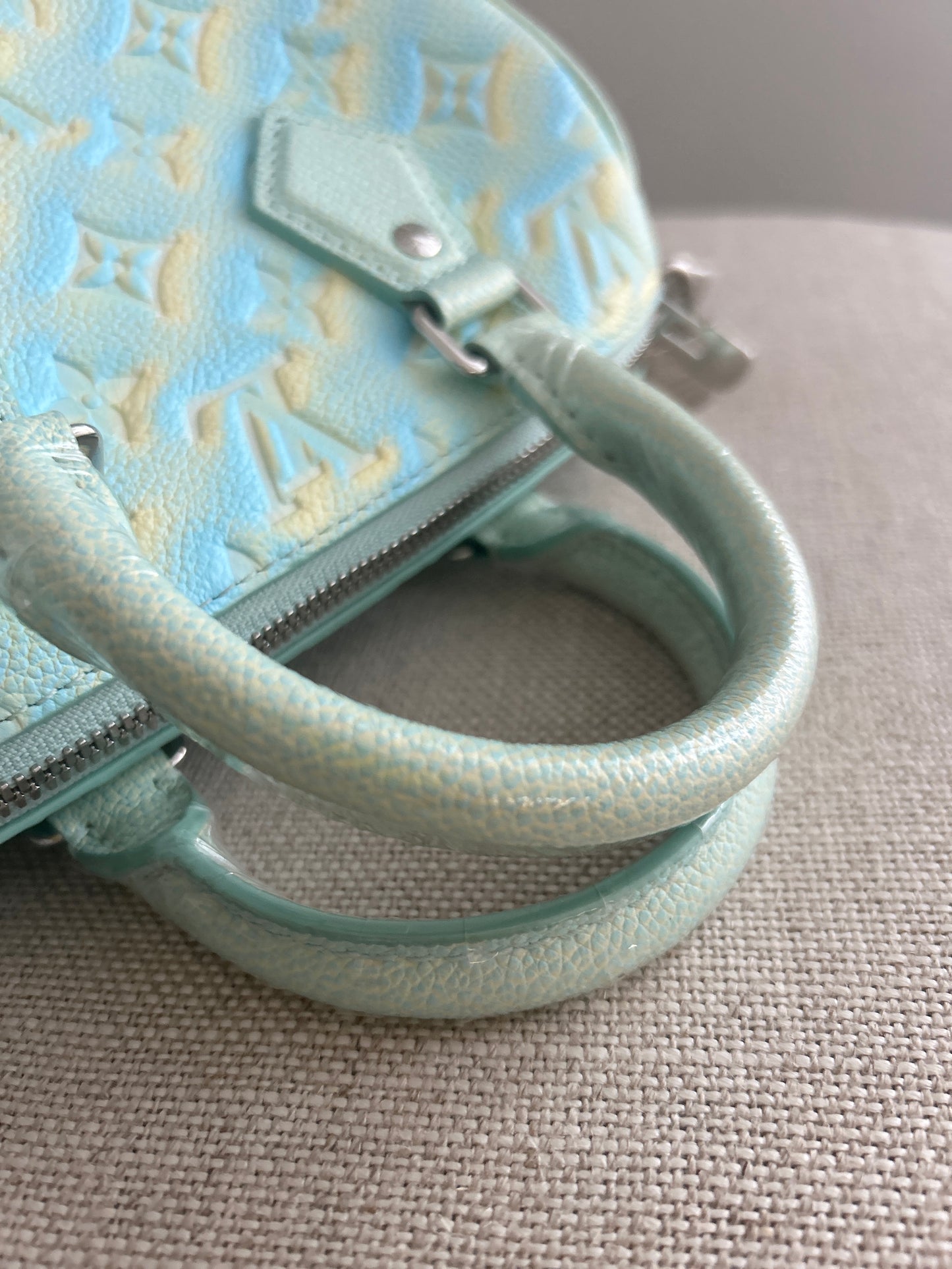 LOUIS VUITTON
Empreinte Monogram Summer Stardust Speedy 20 Water Green (Limited Edition)