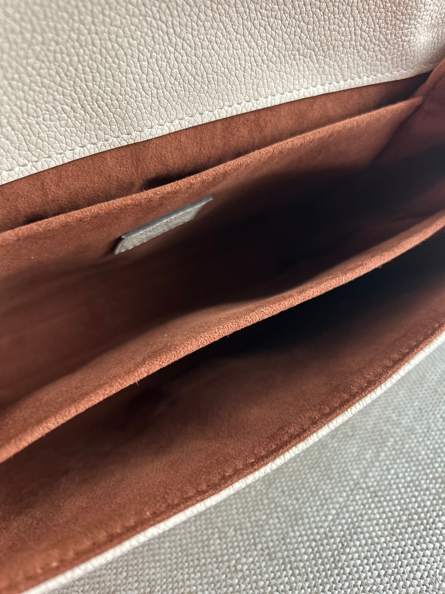 Louis Vuitton Pochette Metis Empreinte Leather in Cream